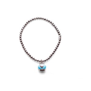 Bracciale Chantecler elastico in argento con ciondolo campanella micro in smalto turchese Bracciale Chantecler elastico in argento con ciondolo campanella micro in smalto turchese