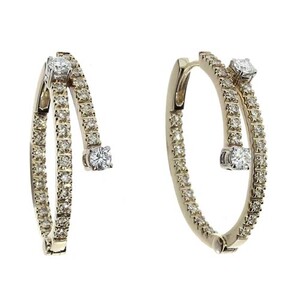 Damiani earrings in gold and diamonds Damiani earrings in gold and diamonds