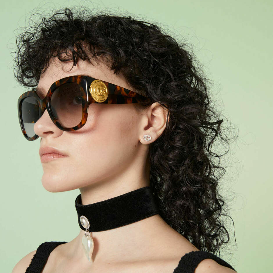 Orecchini Gucci Interlocking G in oro bianco e diamanti