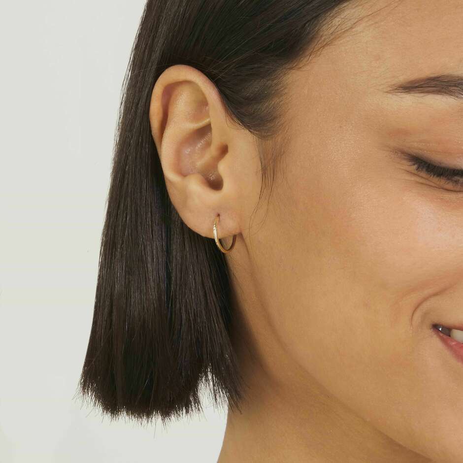 Stroili diamond hoop earrings in yellow gold